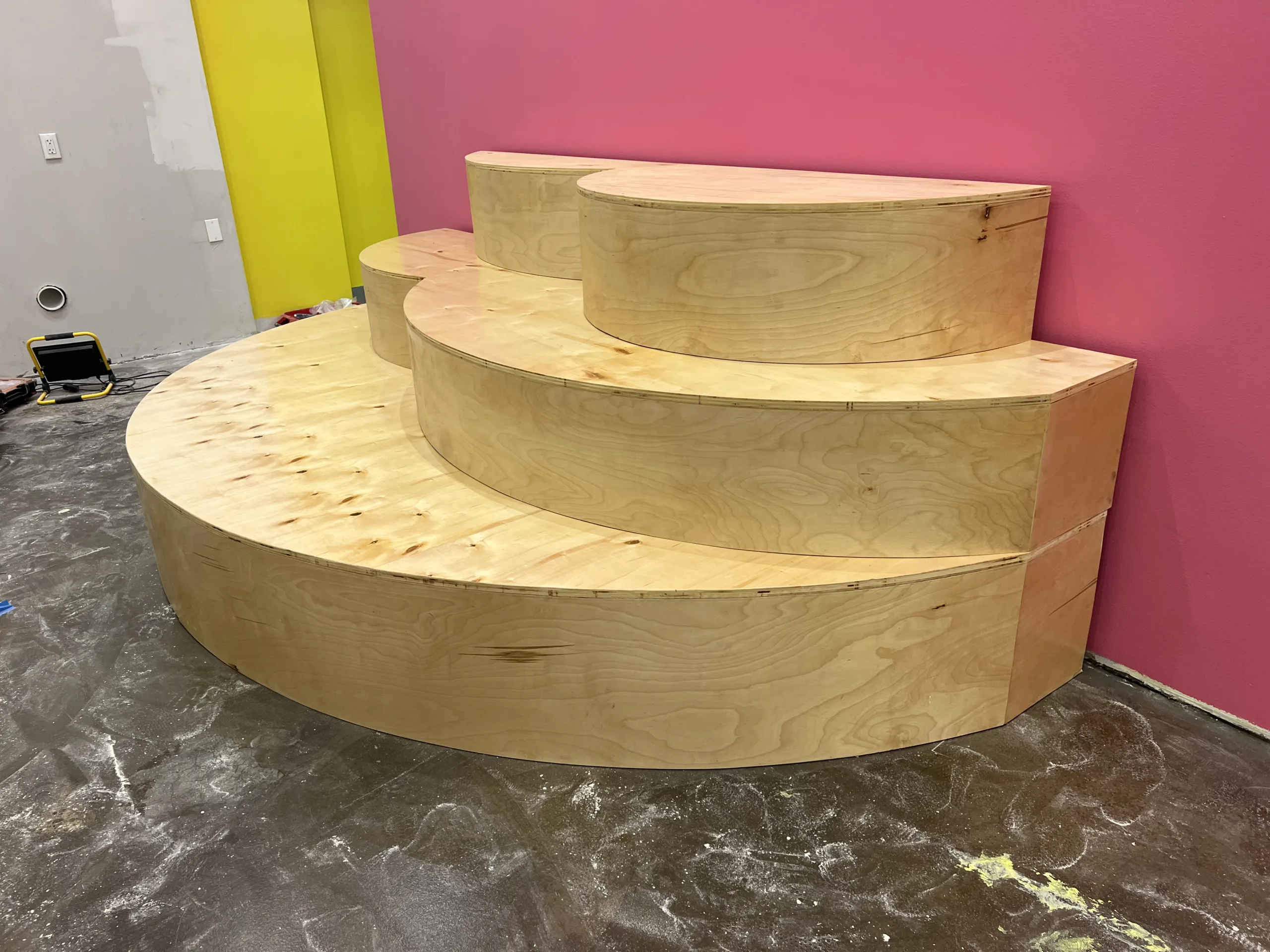 finishedcurvedwooddisplayplatformchicago Handyman Services in Chicago