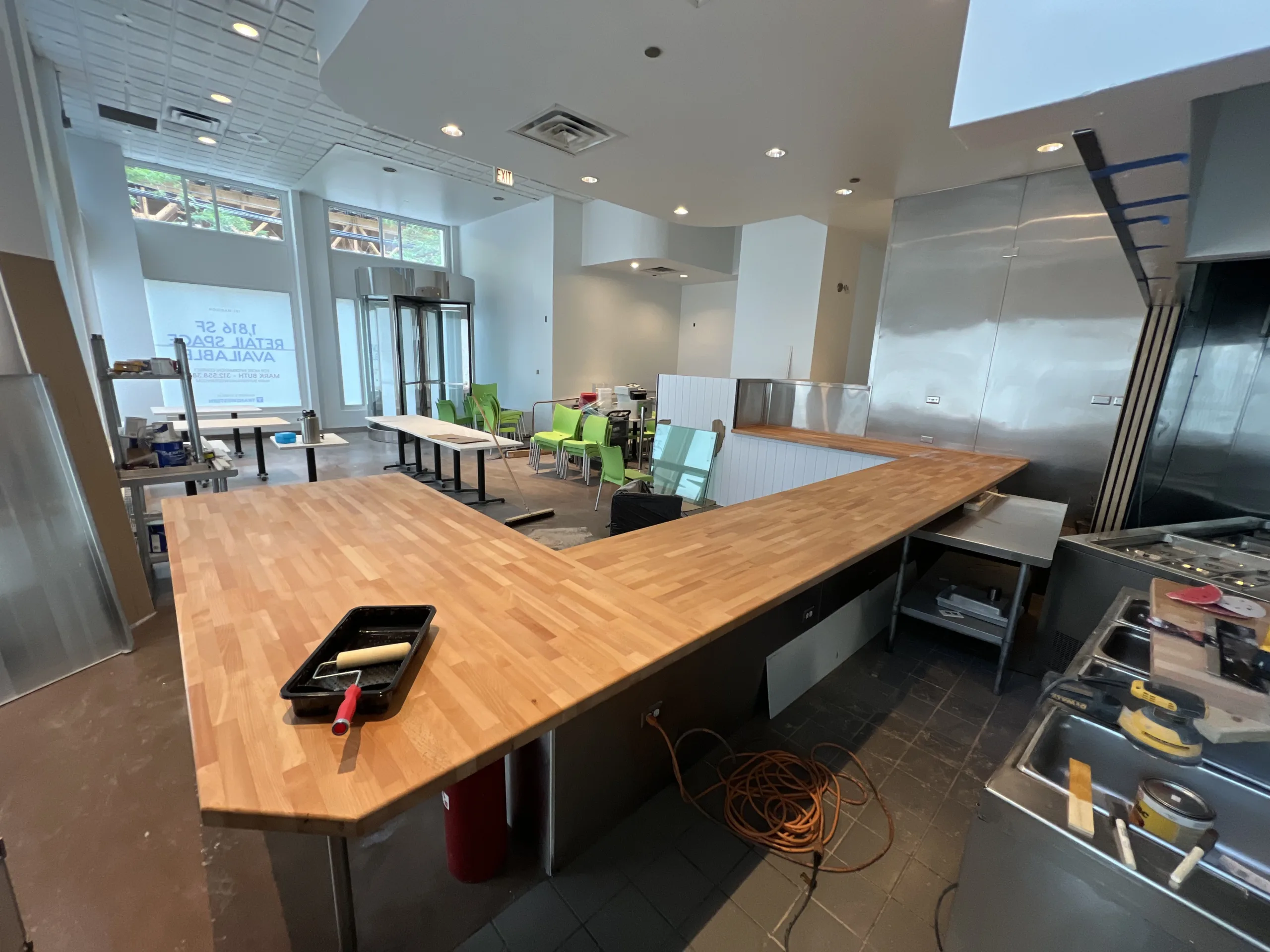 Clear shellac sealer finish applied to birch butcher block countertop in bakery remodel