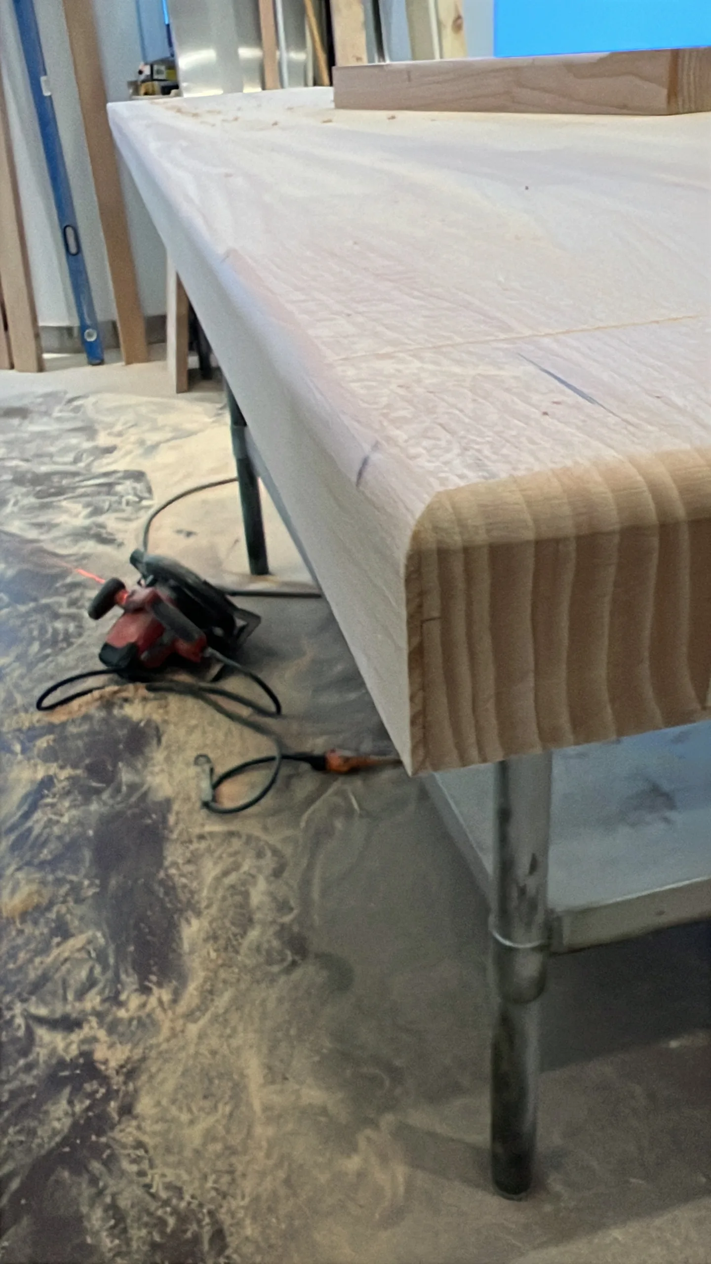 Close view of birch butcher block countertop detail in a bakery counter remodel
