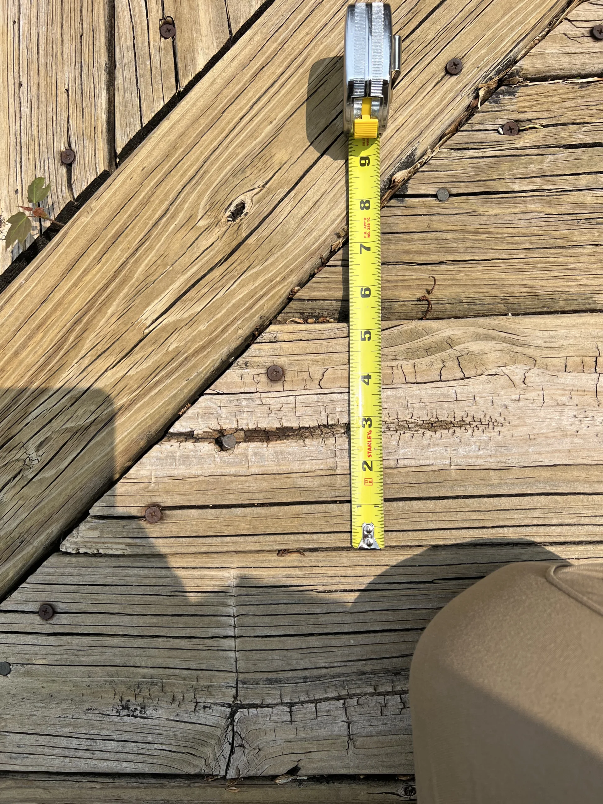 damageddeckboardinspectionbeforerepair Handyman Services in Chicago