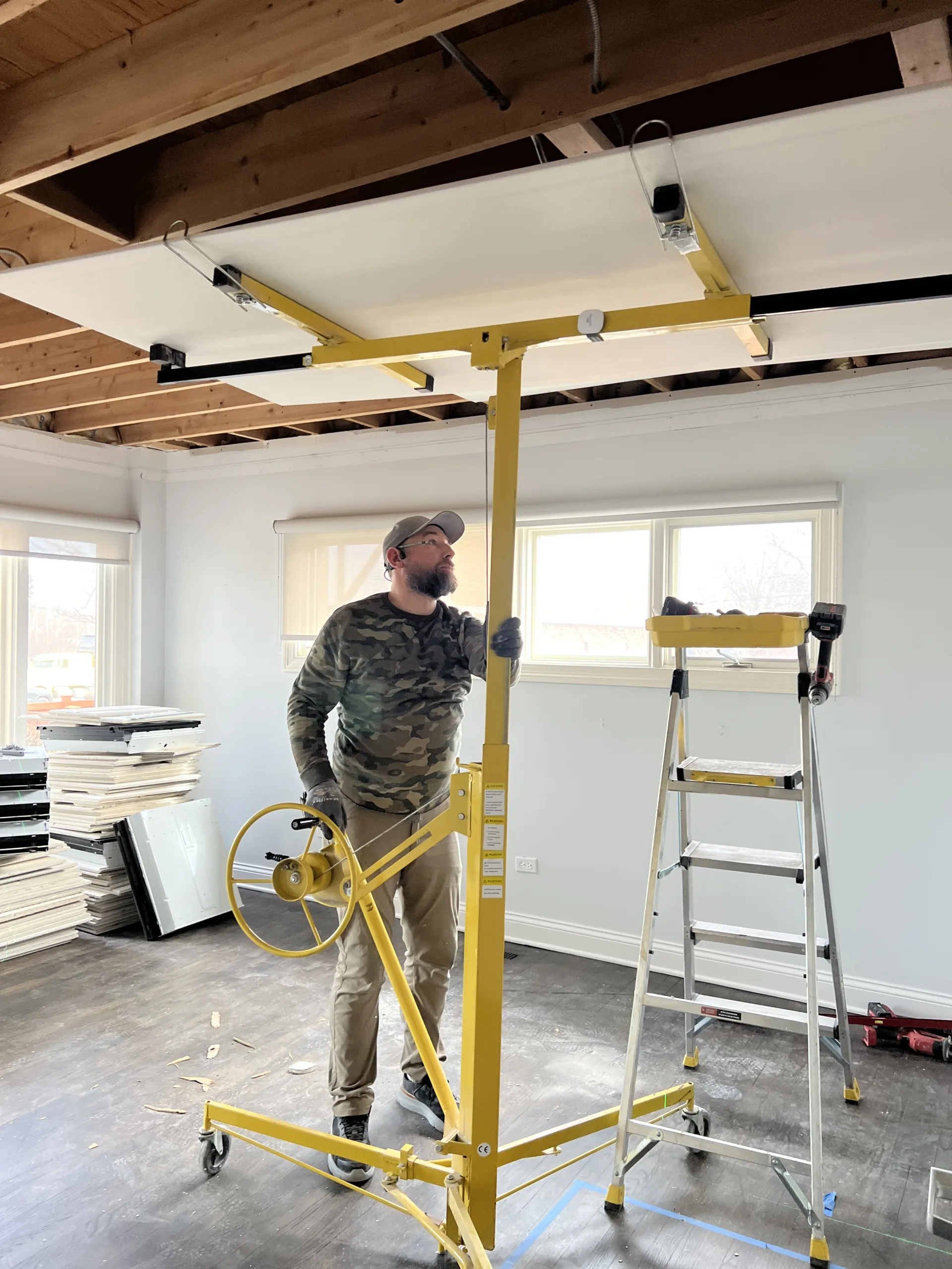 drywallliftinstallingofficeceilingpanels Handyman Services in Chicago