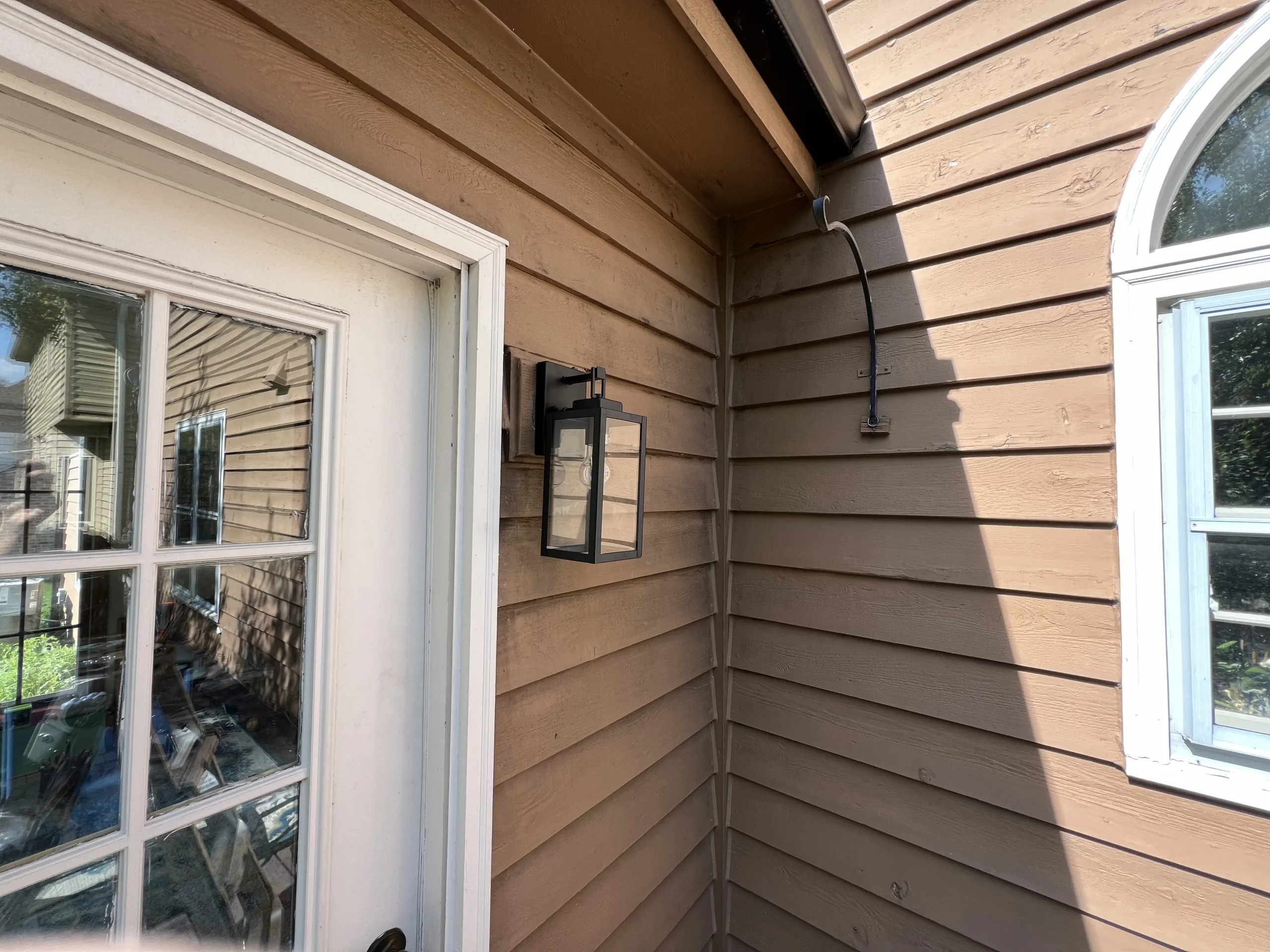 finishedsidedooroutdoorlightreplacementchicago Handyman Services in Chicago