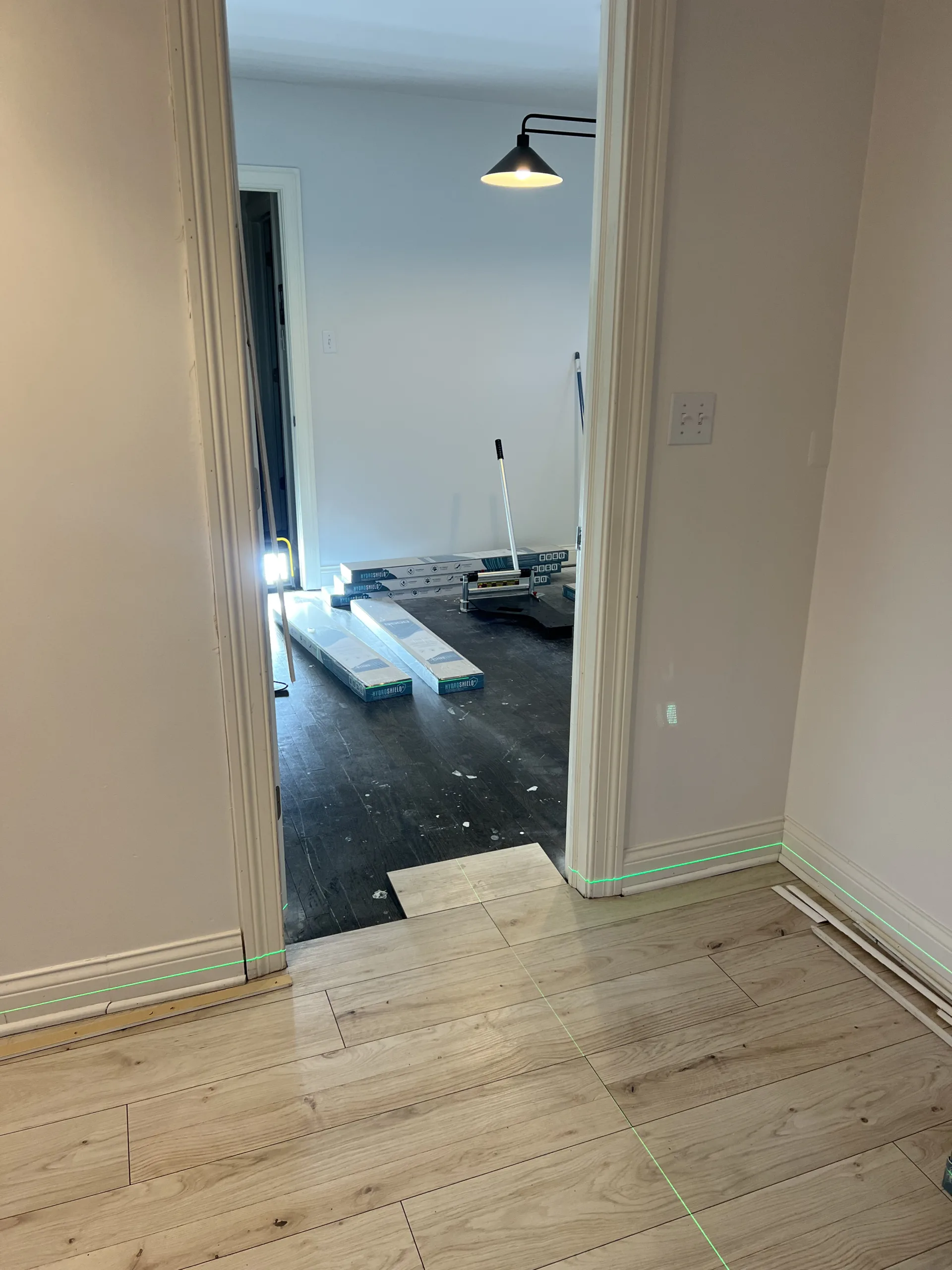 laminateflooringtransitionlayoutatofficedoorway Handyman Services in Chicago