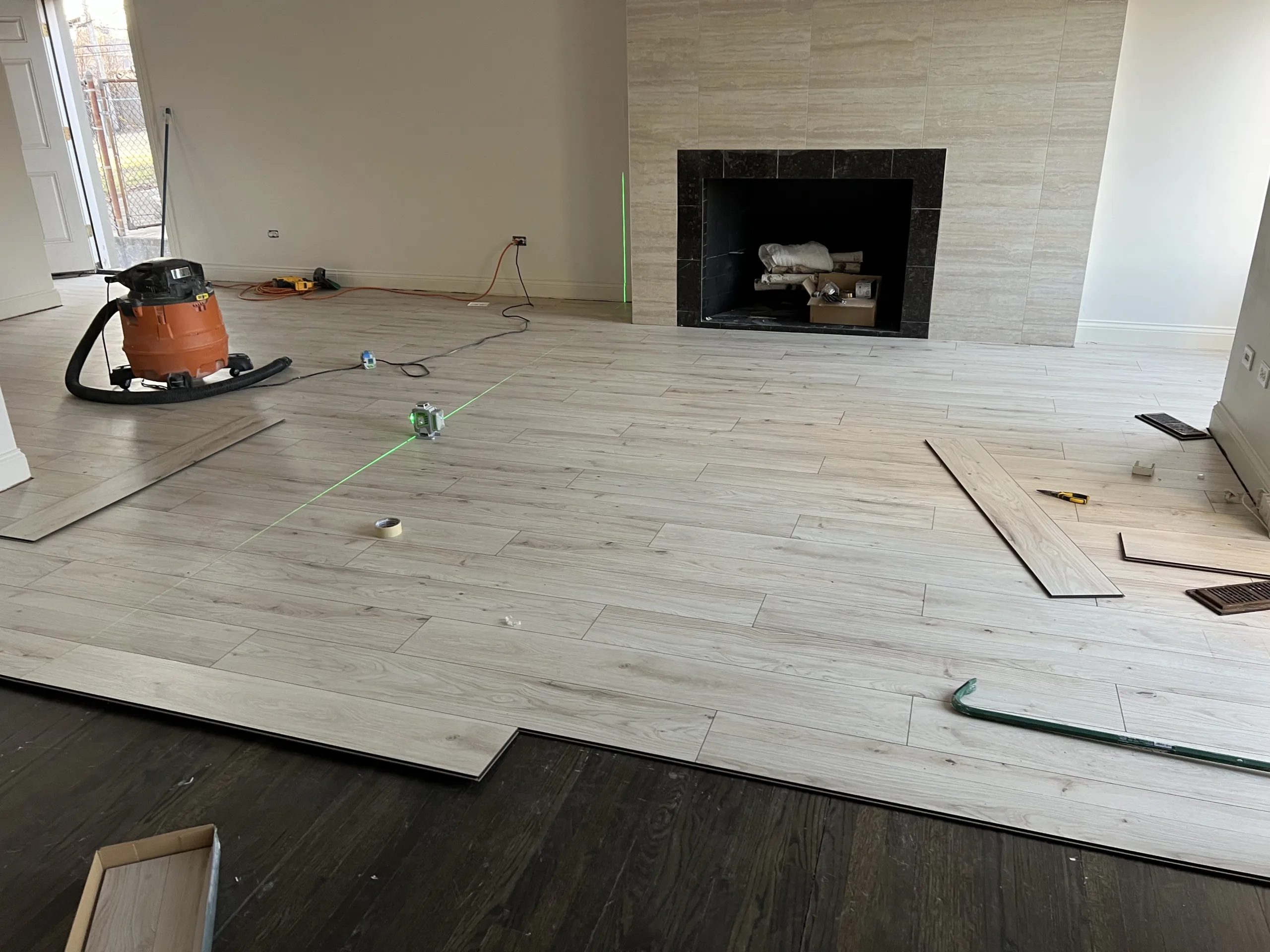 lightwoodlaminatefloorinstallationinprogress Handyman Services in Chicago