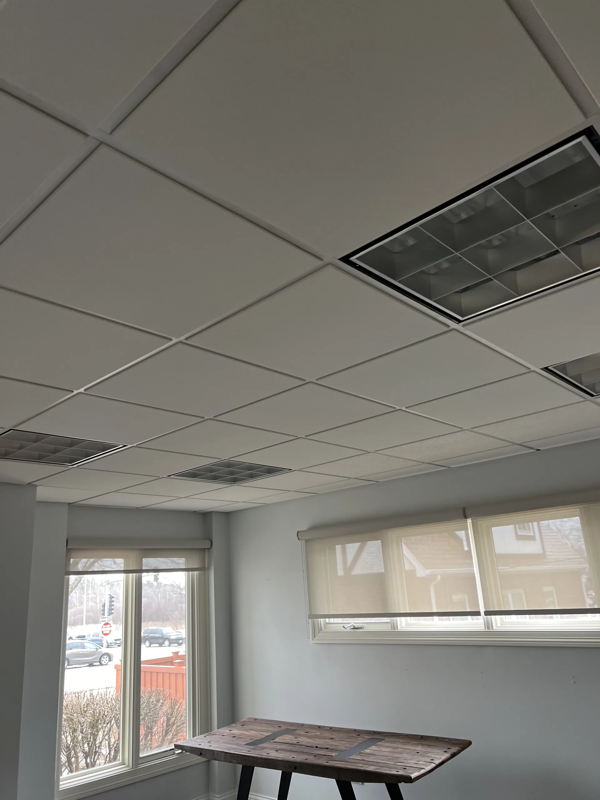 oldacousticdropceilingbeforeofficerenovation Handyman Services in Chicago